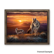 Framed canvas art print of 'The Setting Sun,' depicting coyotes on the prairie at sunset, adding a tranquil touch to any space