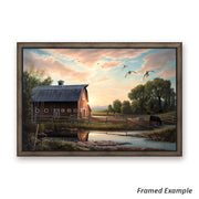 Framed 'Returning Home' canvas art print showcasing a traditional farmstead with ducks and a barn set against a mesmerizing sunset