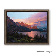 Framed 'A Lasting Impact' canvas art print depicting a vivid sunrise over St Mary Lake in Glacier National Park