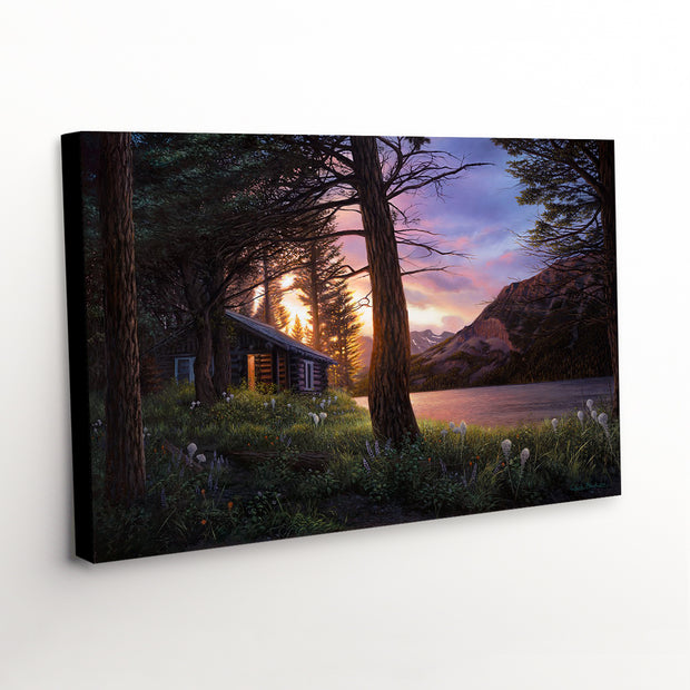 'Blissful Solitude' canvas art print, capturing the serene beauty of Glacier National Park's sunrise, a rustic cabin, and blooming wildflowers