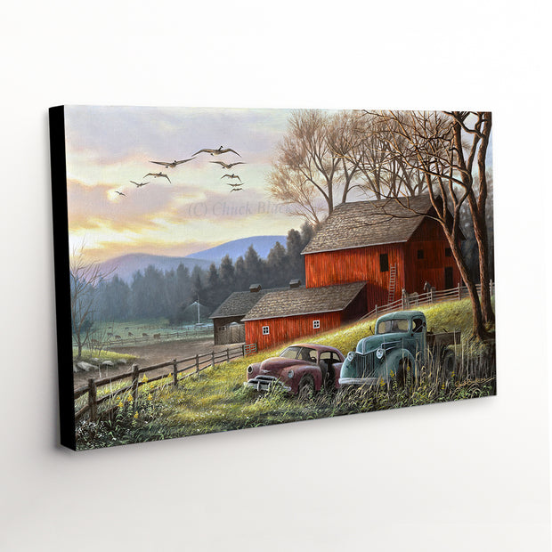 "Countryside Dream" Canvas art print depicts a tranquil farm landscape with vintage trucks, grazing cattle, and a rustic barn
